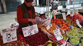 High Street economy shoppers stall holders sellers business UK 4k 50p