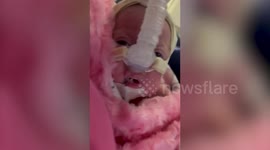 UK gran resuscitates newborn granddaughter TWICE during her daughter's premature home birth