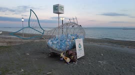 Container for collecting plastic bottles in the form of fish.