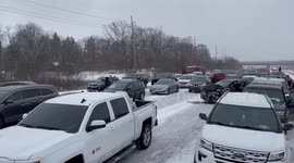 Whiteout conditions cause pile-up on freeway in Michigan, USA