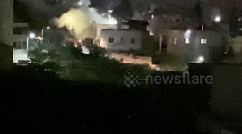 People gather at Palestinian house destroyed by Israeli forces in West Bank's Jenin