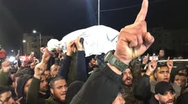 Palestinians carry body of Mohamad Saleh, killed by Israeli forces in clashes during demolition operation in West Bank