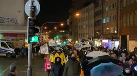 Hundreds march through German city to protest COVID measures