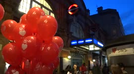 Valentines Day giveaway by TLC outside Earls Court station - London