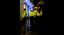 Metropolitan Police detain a man on Coventry Street, London W1, England, United Kingdom