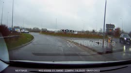 Car uses wrong lane and cuts someone up on roundabout Dash Cam Footage