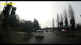 Car Towing Trailer speeds off dangerously overtaking vehicles UK Dash Cam Footage