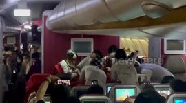 Passenger and flight attendants help pregnant woman give birth on plane in China