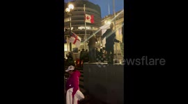 People dance and sing during 'Freedom Convoy in Wellington, New Zealand