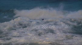 UK surfer daringly braves massive waves amid Storm Dudley's powerful winds