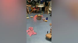 Sparks fly out of charcoal stove as family cooks BBQ