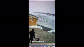 Dramatic moment snow slides from Russian roof onto passers-by