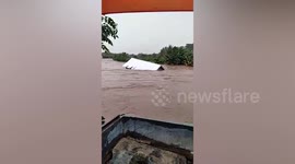 House swept away by flash floods amid heavy rain in Indonesia