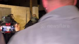 Palestinian residents of the east Jerusalem neighbourhood of Sheikh Jarrah scuffle with Israeli police