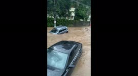 Shocking moment car just floats away on flooded Rio streets in Brazil