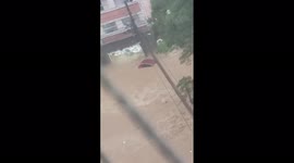 Car washes away during deadly Brazilian flood that has claimed lives of over 100
