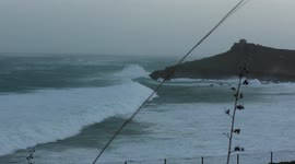 Waves slam into St Ives as Storm Eunice winds ramp-up