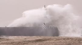 Seawall in Aberystwyth battered by huge waves caused by Storm Eunice