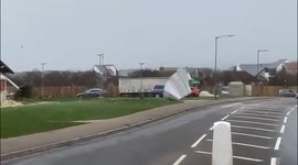 Metal roof ripped off building by Storm Eunice is blown across road in Cornwall