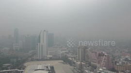 Thick smog clouds Bangkok as city's annual air pollution problem returns