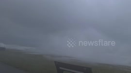 Engulfed by huge waves in blistering Storm Eunice winds on Rhyl seafront