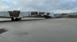 Storm Eunice rips scaffolding cover from Wandsworth Bridge in London