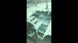 Storm Eunice winds rip tent fabric off London's O2 roof leaving gaping hole