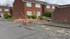 Brick wall knocked over as Storm Eunice hits the East of England