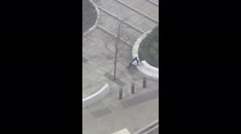 Storm Eunice blows man in suit off his feet in Lime Street, City of London