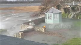 High waves caused by heavy storms hitting a building in Stanpit, Christchurch, UK