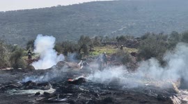 Palestinian protesters clash with Israeli security forces following a demonstration against settlements