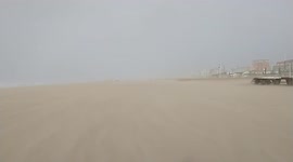 Watch as Storm Eunice blasts sand across a beach near the Hague as winds approach 100mph