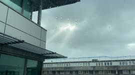 Storm Eunice - View from inside office showing building shaking.