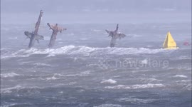 Storm Eunice batters war time relics as well as modern wind turbines in Thames Estuary off Kent, UK