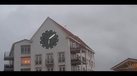 Pieces of roof come off the building in Leiden, Netherlands during storm Eunice