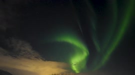Aurora Borealis in Iceland on a cloudy February night, a real time 4K video.