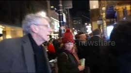 Woman whose dad 'died of COVID' punches man taking part in anti-vax protest outside London Coliseum led by Piers Corbyn