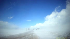 Driving Toward Snow Squalls During Ontario Blizzard