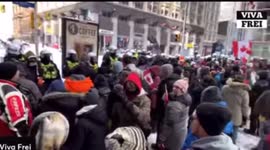 Ottawa Freedom Convoy protesters chant “we love you” to police, who fire percussion grenades