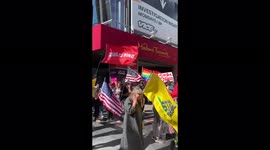 Anti-Biden, Anti Mask, Anti Vax protesters rally in Hollywood California today in busy tourist hot spot, Hollywood & Highland Avenue in Los Angeles, California.