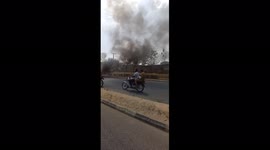 A commercial bus caught fire while on motion at University of Ibadan road Ibadan