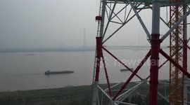 Aerial Footage Of The World's Highest Power Transmission Tower Construction In Taizhou, Jiangsu, China