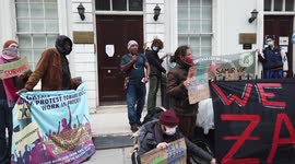 Anti-imperialism protests against corporate greed extraction resources, London, UK