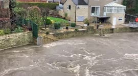 UK's Storm Franklin turns River Aire into raging torrent in Horsforth, Leeds