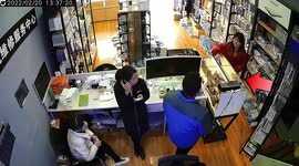 Woman drops phone into fish tank as she mistakes it for counter in China