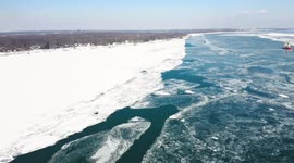 Cinematic drone shot of freighter on the Detroit river near Detroit Michigan