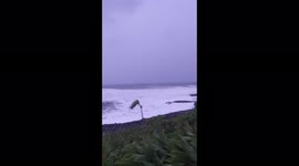 Rough waves slam island of Reunion as Cyclone Emnati strikes area