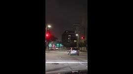 A silver SUV was caught running a red light in Downtown Houston