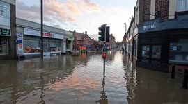 Floods swamp Shrewsbury in the UK as the River Severn bursts its banks, reaching record levels