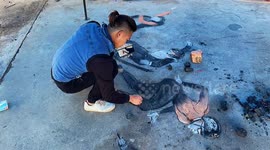 Chinese man uses charcoal to draw Winter Olympics gold medallists